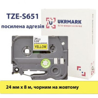 Стрічка для принтера етикеток UKRMARK B-S-T651P, з посиленою адгезією, 24мм х 8м, black on yellow, аналог TZe-S651 (900332)